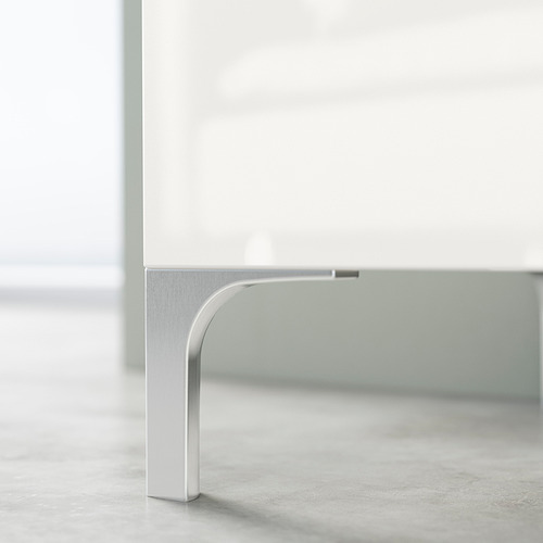 Modern white tv stand with sleek metal legs, minimalist design.