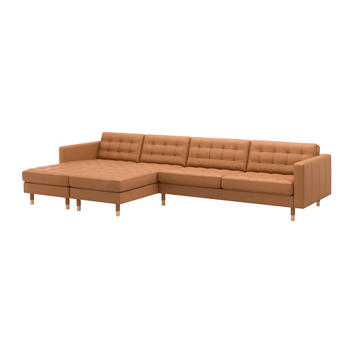 Sofá modular de cuero marrón en forma de L con respaldo y cojines de asiento capitonados, patas de madera. Diseño moderno.