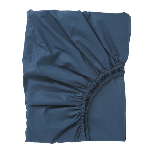 Blue fitted bed sheet, wrinkled, deep pockets, elastic edges, soft.
