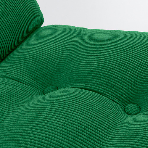 Silla giratoria de tela acanalada de color verde brillante en primer plano, que muestra una textura y un diseño de alta calidad.