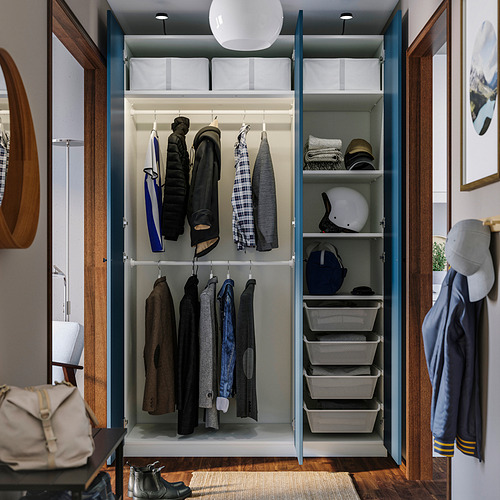 Open closet with clothes hangers, shelves, and storage baskets.
