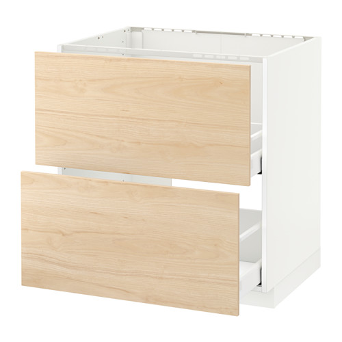 Mueble de cocina METOD con cajones de madera de fresno claro, marco blanco, tres cajones, aspecto robusto y moderno.