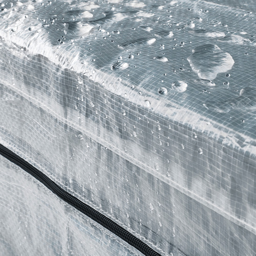El primer plano de las fundas HYLLIS es impermeable, con borde con cremallera, diseñado para proteger los artículos del polvo y la lluvia.