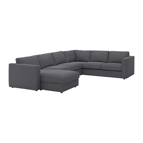 Veterano sofá seccional gris en forma de L, felpa con tela gris oscuro, diseño minimalista moderno, cojines profundos, asientos versátiles.