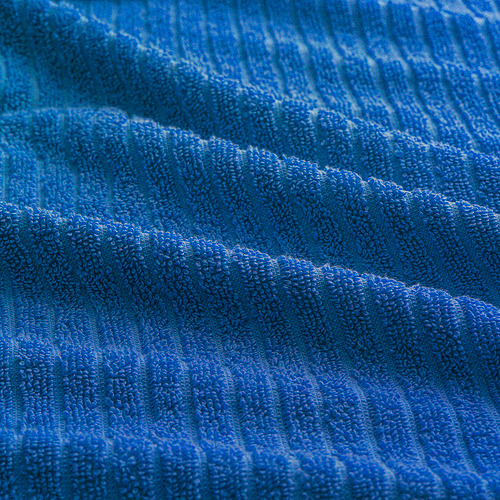 Azul brillante, suave, material de felpa, cuidadosamente doblado, de alta calidad.