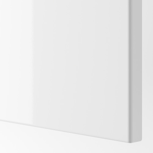 Mueble blanco liso con acabado impecable, detalle de borde curvo.