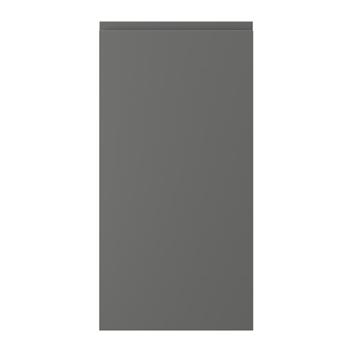Una puerta de armario rectangular gris con un diseño suave y minimalista. Incorpora asas integradas y forma parte de la serie VOXTORP.