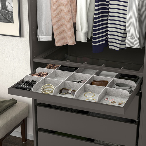 Organized wardrobe tray with compartments for accessories, featuring slow-close mechanism.