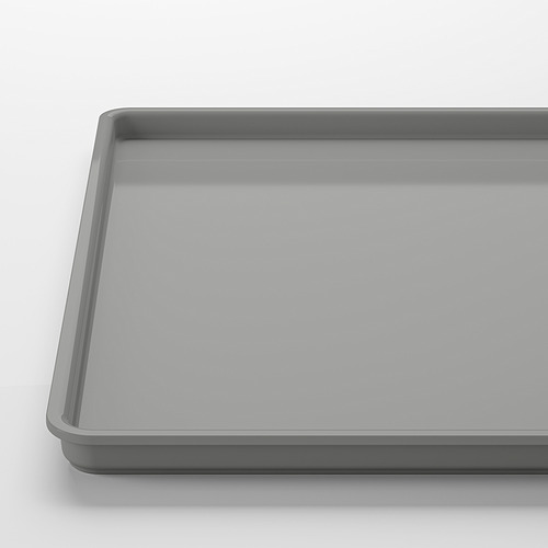 Tapa de plástico rectangular gris, superficie lisa, bordes uniformes.