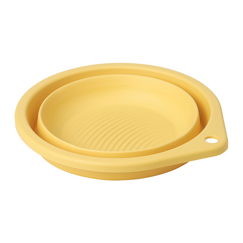 PEPPRIG yellow plastic foldable basin, round with grooved bottom, compact design.