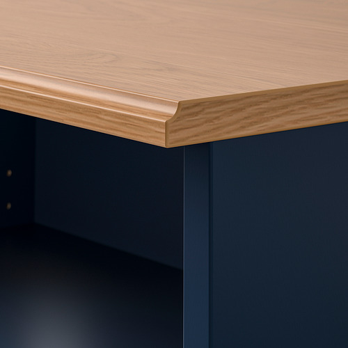 Tablero SKRUVBY con acabado de roble: superficie lisa y duradera de tablero de partículas.