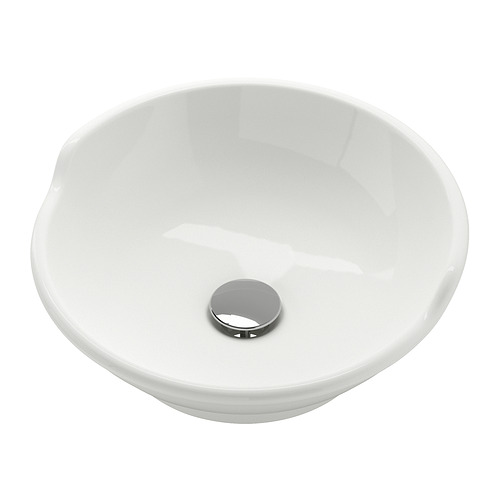 Un lavabo de cerámica blanca VÄSTERSJÖN con cubeta redonda, bordes suaves y respaldo elevado. Tiene una tapa cromada para la trampa de agua.