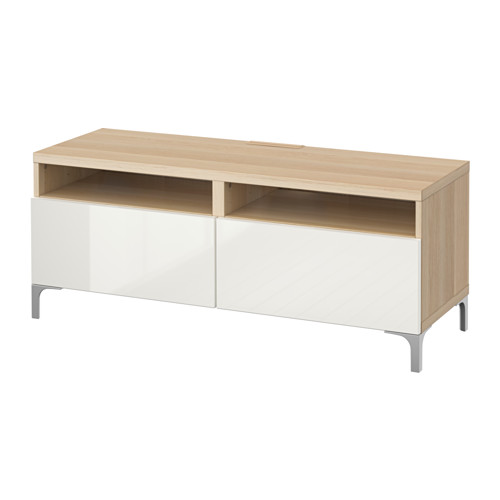 Modern white and light wood tv stand with 2 drawers, open shelf, and metallic legs for cable management.