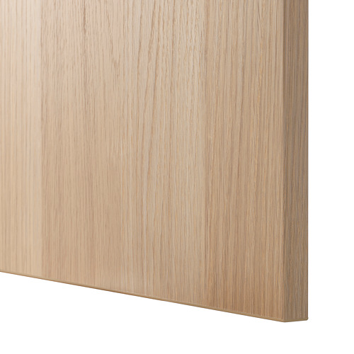 Primer plano del detalle del armario BESTÅ con vetas de madera natural; Acabado suave, textura de grano fino.