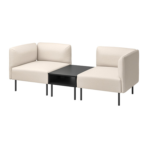 Two light beige armchairs with a matching coffee table, modern design, fabric upholstery, metal legs.