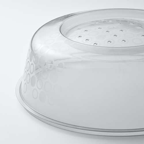 Tapa de plástico transparente con pequeños patrones circulares y orificios de vapor, diseñada para platos aptos para microondas.