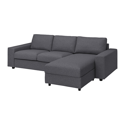 Sofá modular VIMLE gris oscuro con cojines sobre fondo blanco. Diseño moderno y angular con funda de tela extraíble y lavable a máquina.