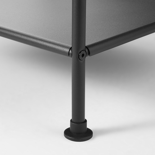 Pata de mesa de metal negro con base ajustable, conectada a una superficie plana.