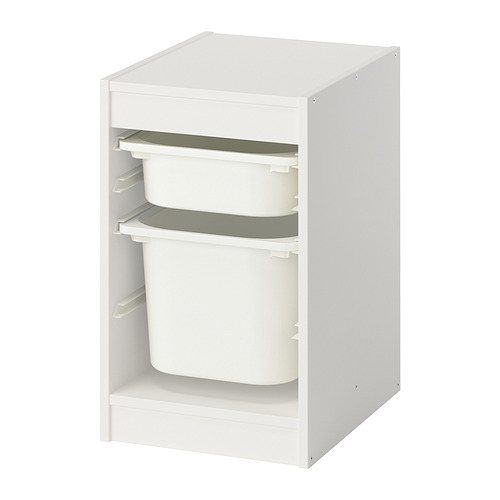 Producto: Unidad de almacenamiento blanca TROFAST, forma rectangular, tres compartimentos abiertos con contenedores de plástico, diseño modular.