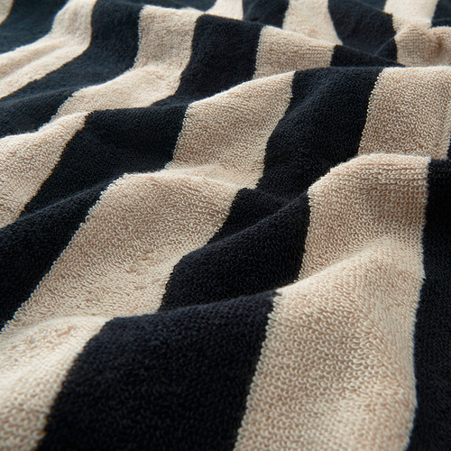 Toalla gruesa de rayas negras y beige, suave y absorbente.