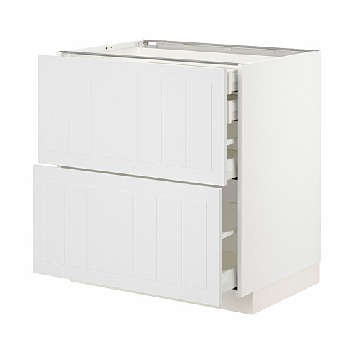 White METOD kitchen cabinet with multiple shelves and drawers.