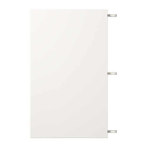 White VEDDINGE cabinet door with nickel hinges.