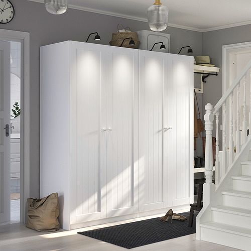 Armario PAX: blanco, alto con decoración en la parte superior.