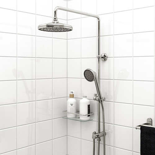 VOXNAN shower kit in chrome: hand/head sprayer, tiled wall, glass shelf, black towel.
