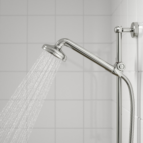 A chrome shower head with a full spray function in action, mounted on a adjustable arm, with water flowing down.