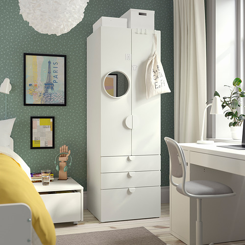Modern kids room with SMÅSTAD wardrobe, desk, and paris poster.