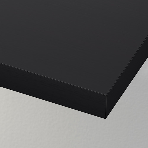 Elegante tablero de mesa negro moderno. Acabado liso y brillante con bordes afilados. Diseño minimalista y artesanal de calidad.