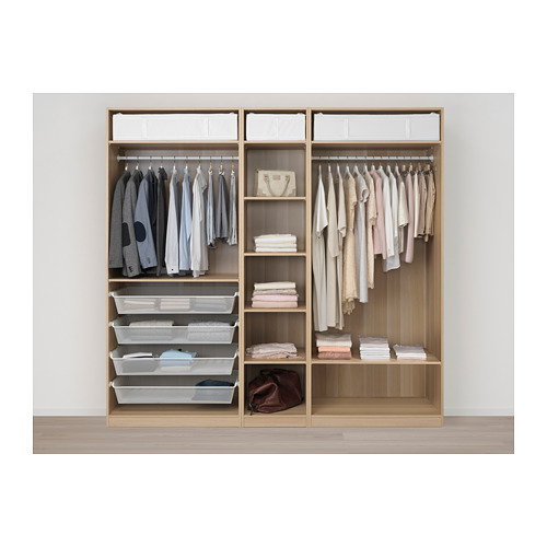 Organized wardrobe with clothes, shelves, and storage bins.