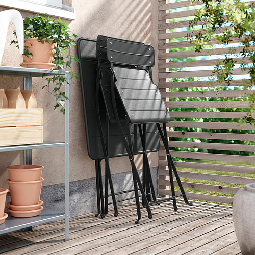 Sillas de exterior plegables de color negro, apilables, perfectas para balcones.