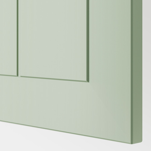 Primer plano del mueble de cocina METOD, acabado verde liso, calidad de construcción robusta.