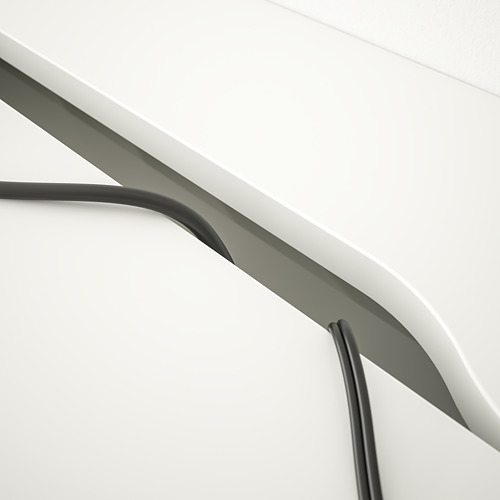 Escritorio moderno con cajones incorporados y gestión de cables, elegante y funcional.