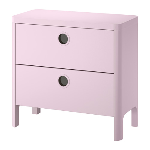 Mueble cajonero rosa claro de dos cajones con tiradores circulares negros.