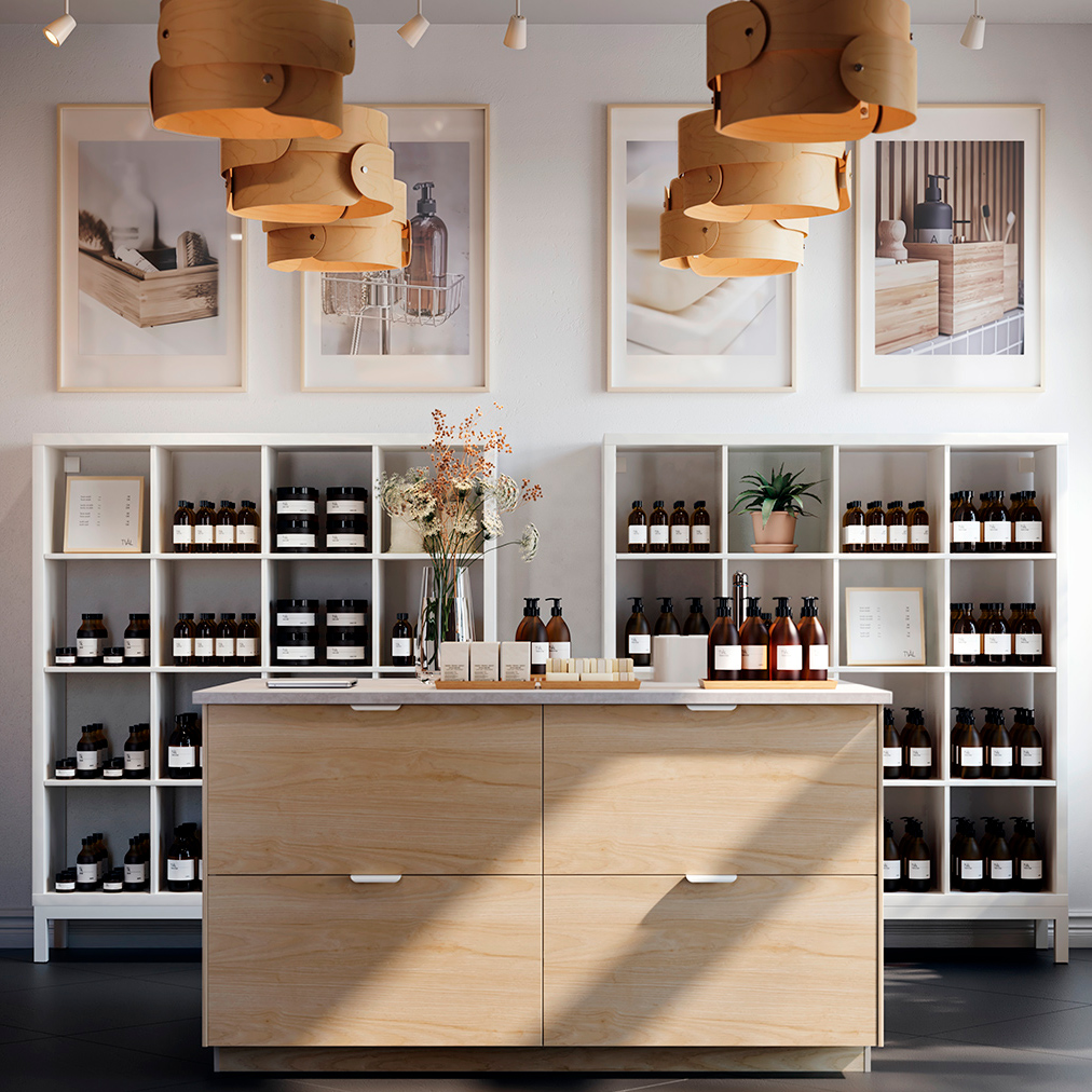 Spa environment in a modern elegant sophisticate style, front view, at the back there is a modern open cabinet full of bottles above some pictures showing the services they provide, and on one side a large window, an island type counter style modern wood.