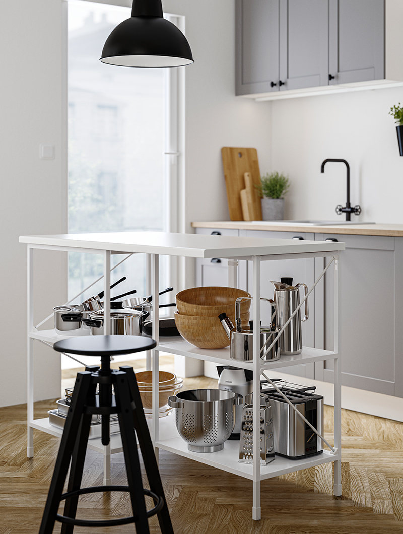 Kitchen island modeerna with white metal frame with large pots and pans underneath is a high black stool.