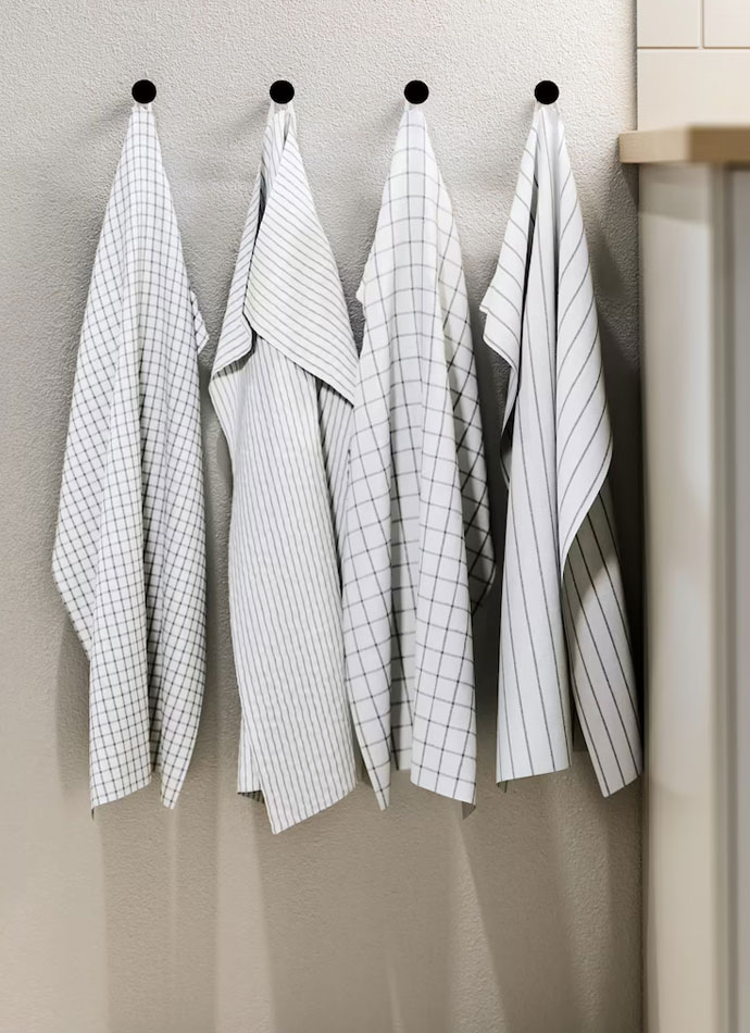 kitchen towels hung on the wall