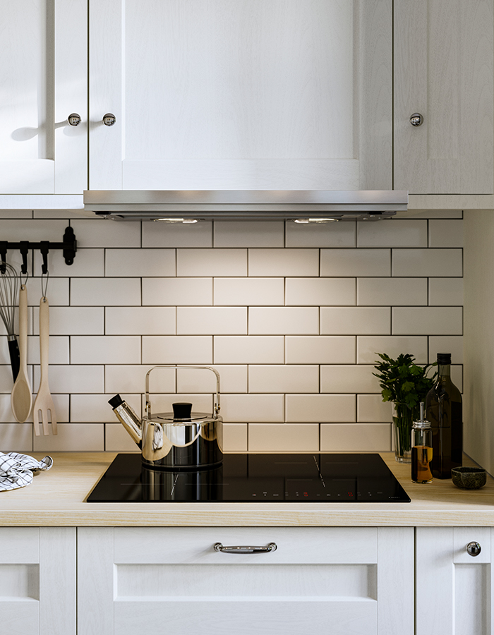 Kitchen with ENKÖPING cabinet fronts, PINNARP countertop, and MATMÄSSIG induction cooktop.