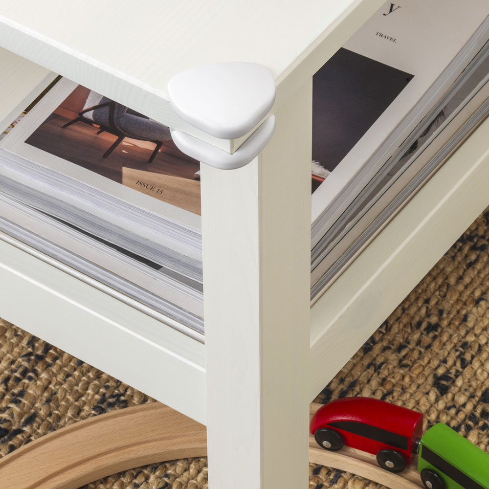 A HAVSTA coffee table with UNDVIKA corner protectors.