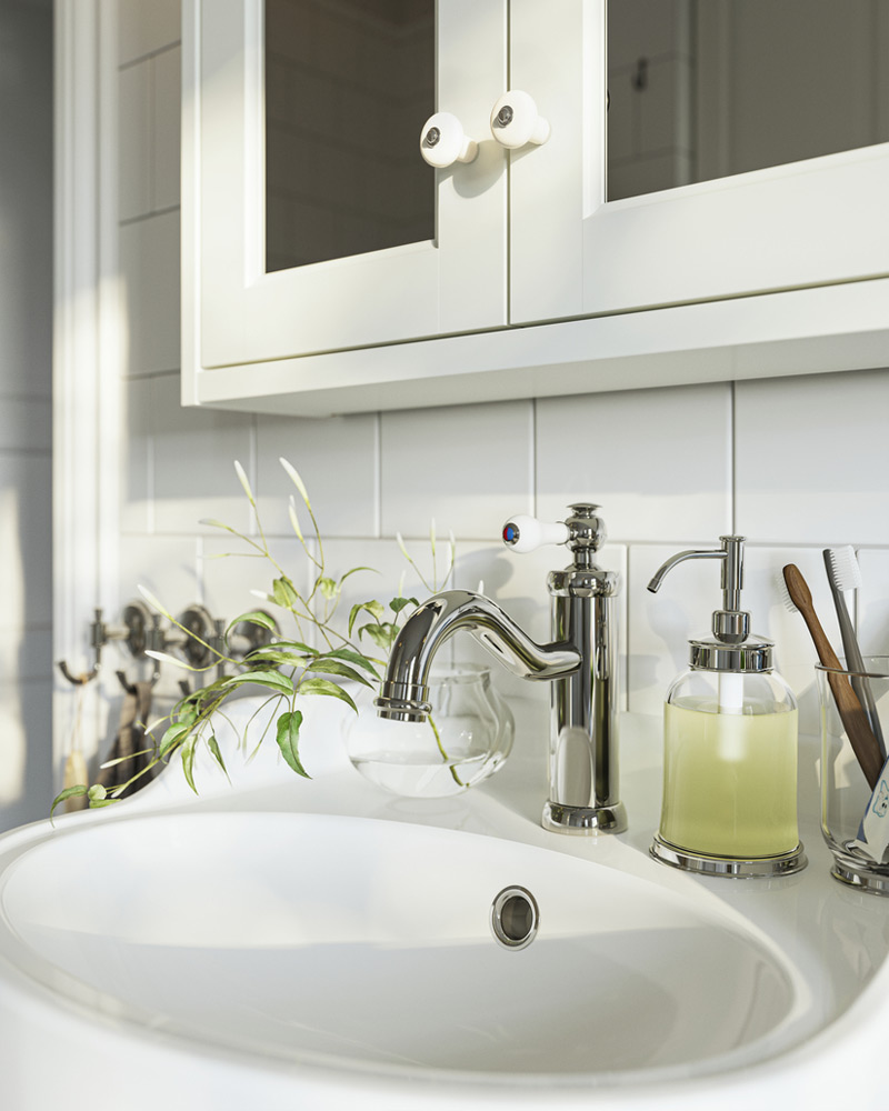 RUTSJÖN washbasin with HAMNSKÄR faucet and TÄNNFORSEN mirror cabinet.