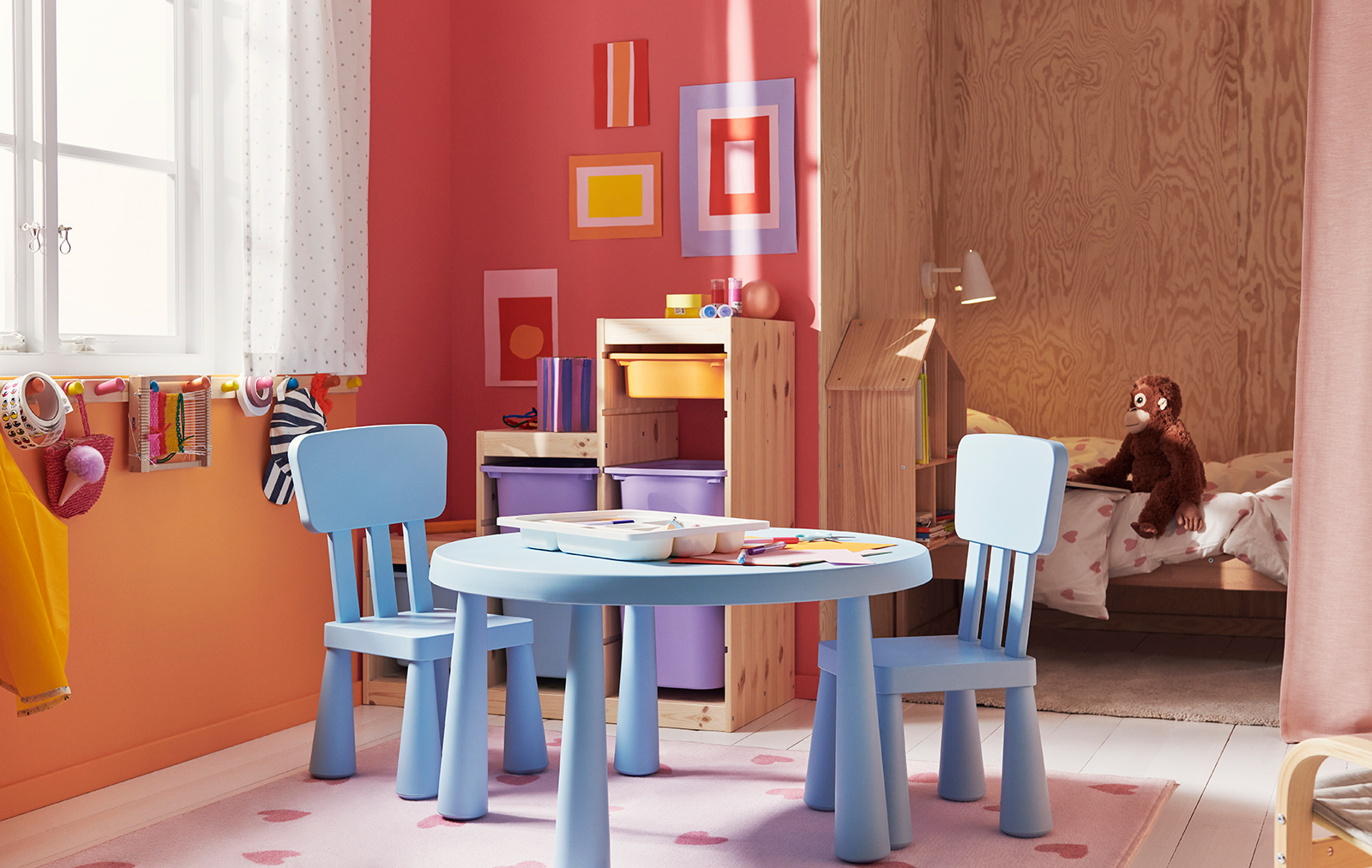  A set of MAMMUT children's chairs and table with several TROFAST storage boxes in the background