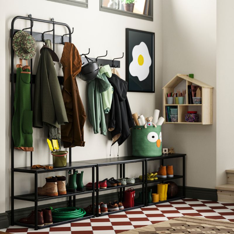 Functional entryway with coat racks, shoe bench, and baskets—perfect for staying organized when coming home.