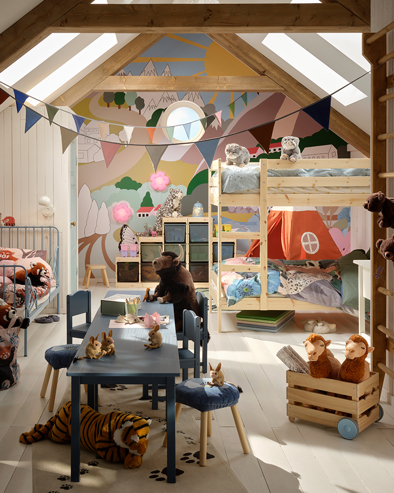 A bedroom for three children in an attic space, decorated and furnished with ALPTALL collection.