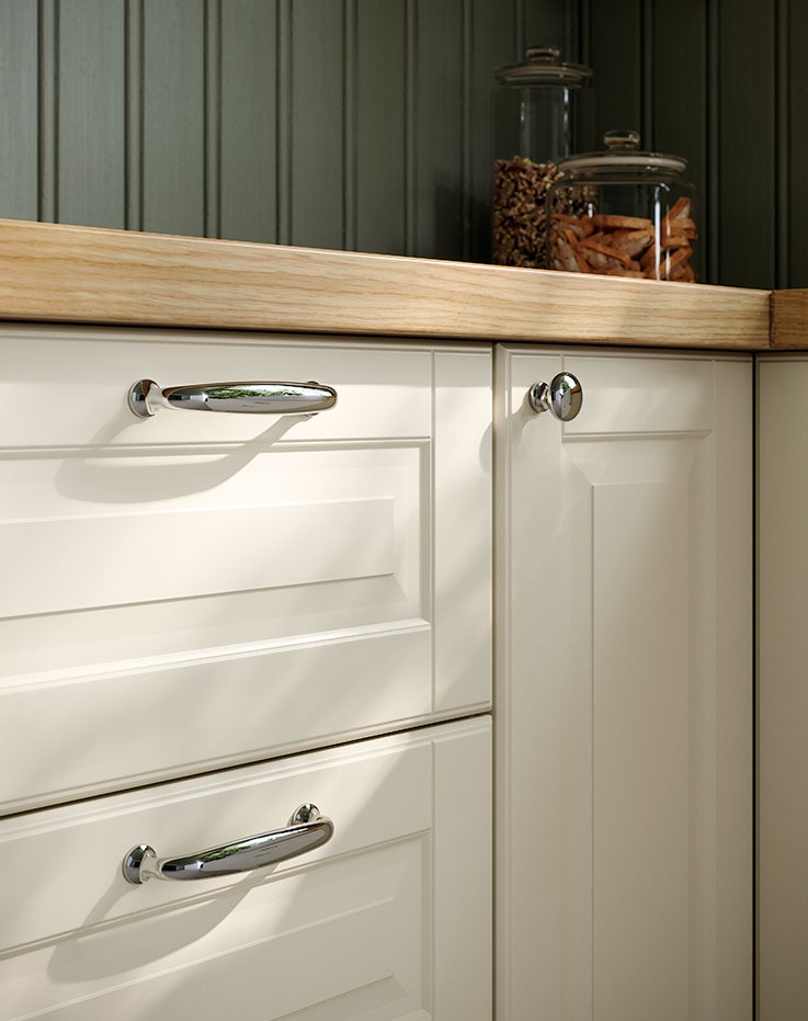 Traditional style IKEA drawer fronts fitted with ENERYDA chrome-plated handles and ENERYDA chrome-plated knobs.